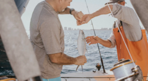 holding fish